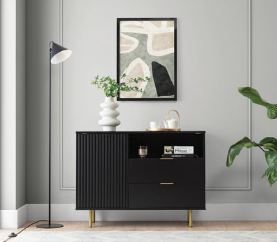 mobiletto soggiorno moderno 2 cassetti vano e anta in legno colore nero effetto cannettato gambe in metallo dorato
