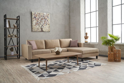 divano moderno angolare con penisola imbottito e rivestito in velluto colore crema