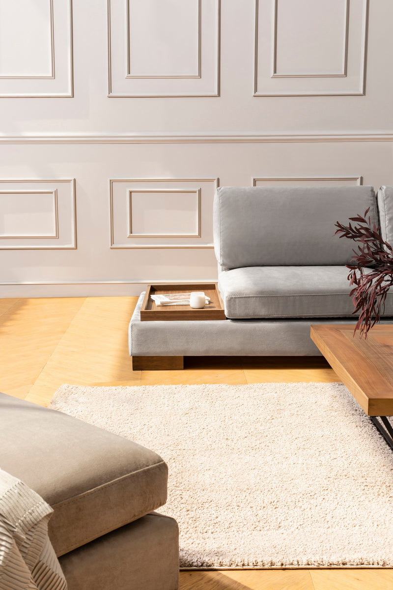 Divano in tessuto ad angolo con ripiano portaoggetti cm 313x97x80h - vari colori