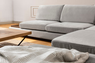 Divano in tessuto ad angolo con ripiano portaoggetti cm 313x97x80h - vari colori