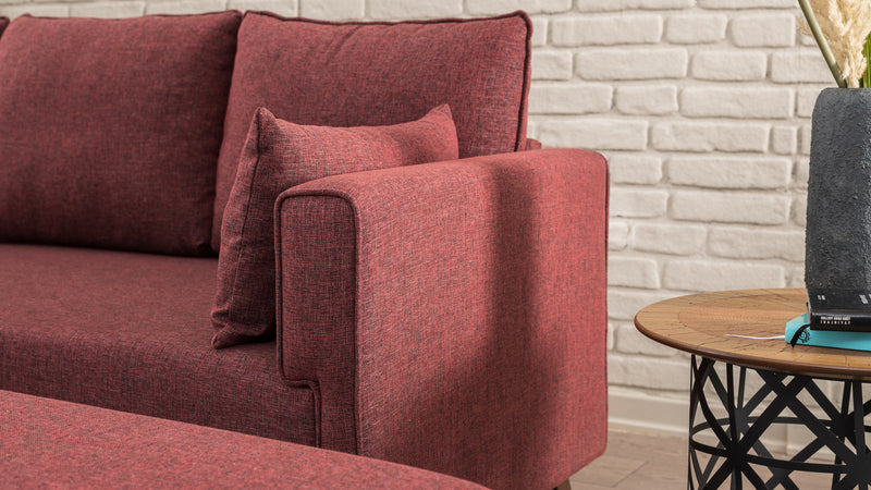 Divano letto moderno con penisola e pouf in tessuto cm 205x140x80h - vari colori