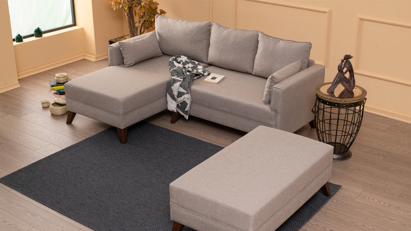 Divano letto moderno con penisola e pouf in tessuto cm 205x140x80h - vari colori