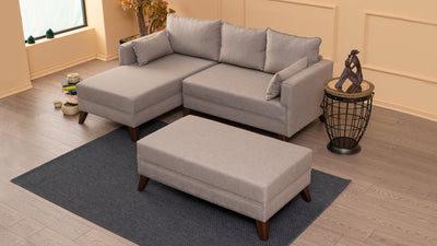 Divano letto moderno con penisola e pouf in tessuto cm 205x140x80h - vari colori
