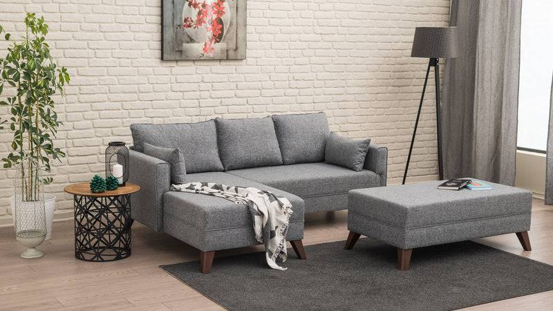 Divano letto moderno con penisola e pouf in tessuto cm 205x140x80h - vari colori