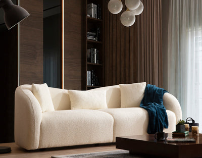 divano design 3 posti da salotto con cuscini in tessuto colore crema