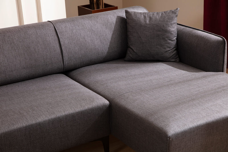Divano angolare moderno con penisola in tessuto trasformabile in letto cm 270x140x67h - vari colori