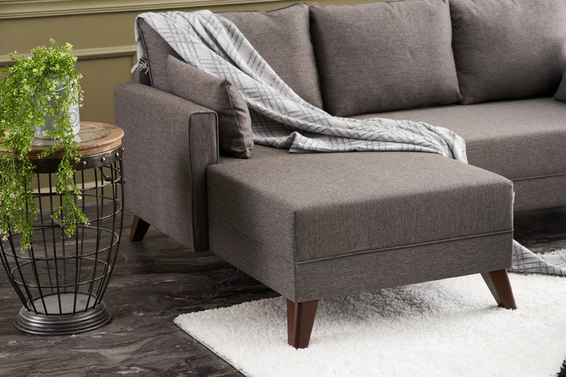 Divano letto angolare moderno con penisola rivestito in tessuto cm 205x140x85h - vari colori