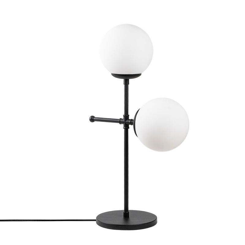 lampada da comodino tavolo struttura ad incrocio in metallo nero con 2 paralumi a sfera in vetro bianco