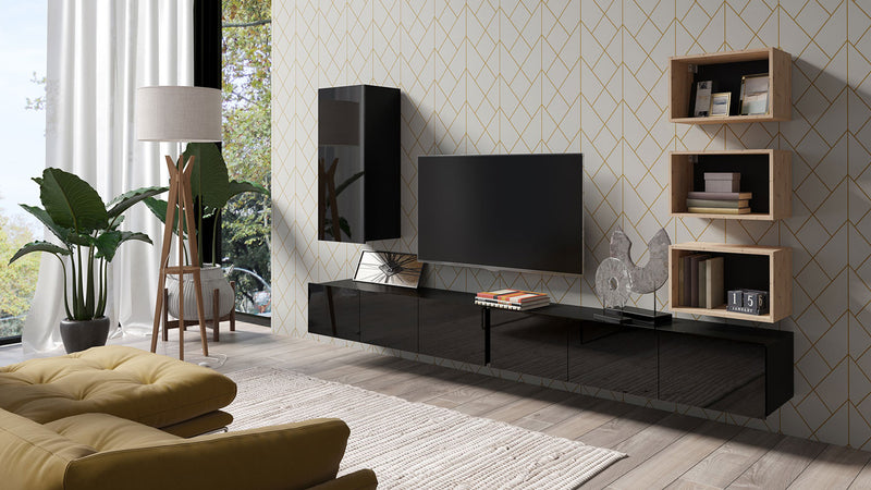 Parete da salotto moderna con mobile tv colore nero e vani rovere