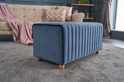 Pouf rettangolare imbottito rivestito in tessuto blu con bordino nero cm 80x40x40h