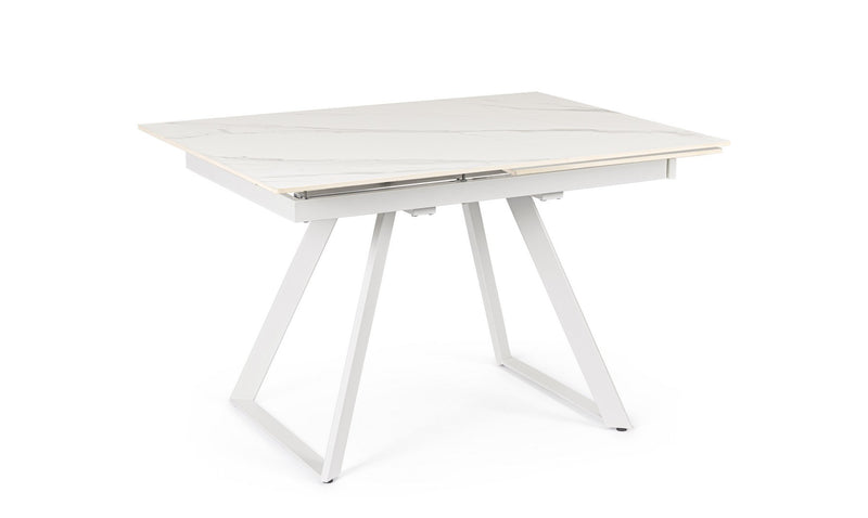 Tavolo moderno con piano in ceramica effetto marmo e gambe colore bianco cm 120/180x90x76h