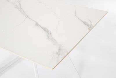 Tavolo moderno con piano in ceramica effetto marmo e gambe colore bianco cm 120/180x90x76h