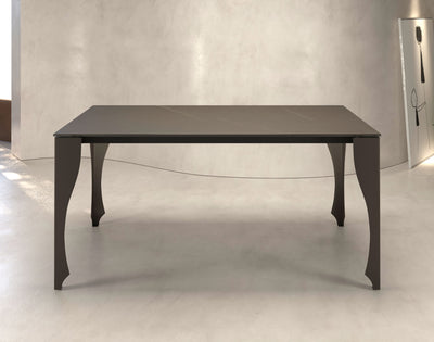 Amery - Tavolo design allungabile gambe sagomate piano in vetro o ceramica - vari colori