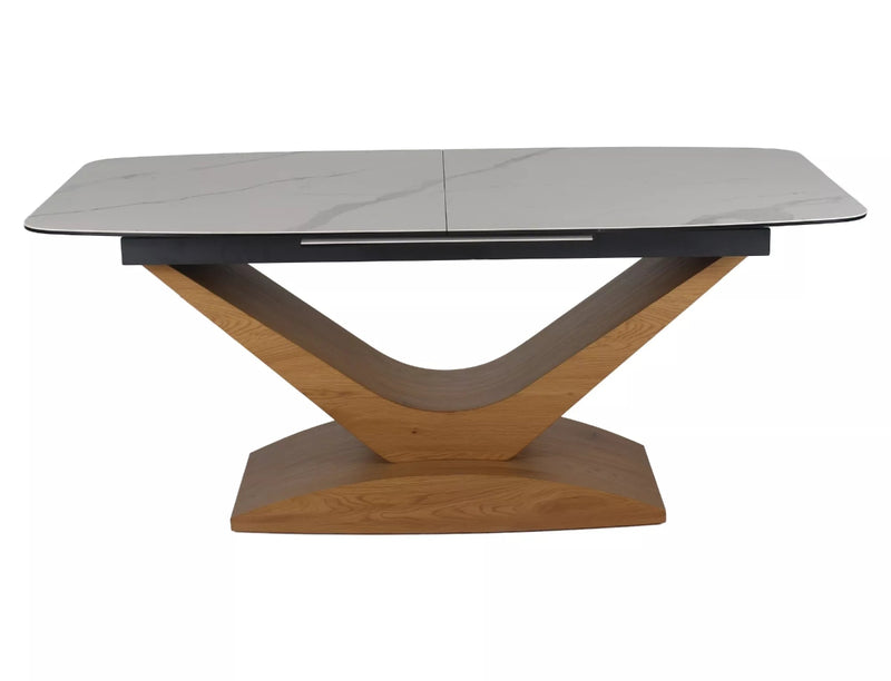 Tavolo moderno allungabile con piano ceramica effetto marmo base colore rovere cm 180/240x95x76h
