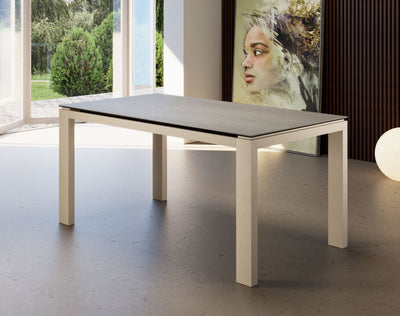 tavolo da pranzo allungabile moderno piano in ceramica pietra savoia perla gambe in legno frassino