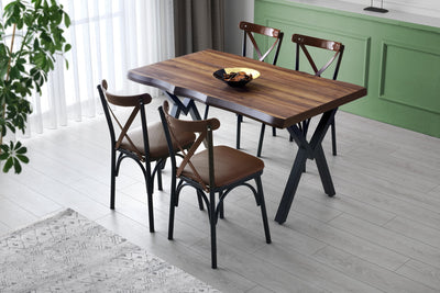 Tavolo da pranzo fisso moderno rettangolare con ripiano in legno color noce opaco con sfumature più chiare, gambe in metallo nero opaco. Dimensioni cm 140x80x75h