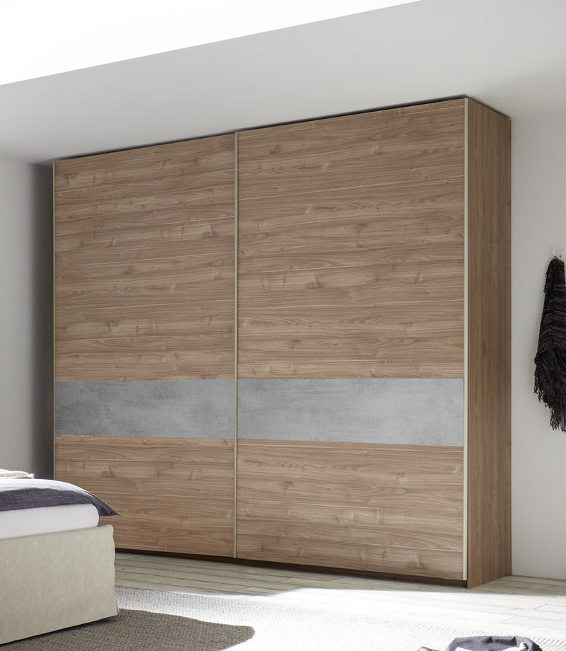 armadio da camera moderno scorrevole in legno noce con inserto cemento