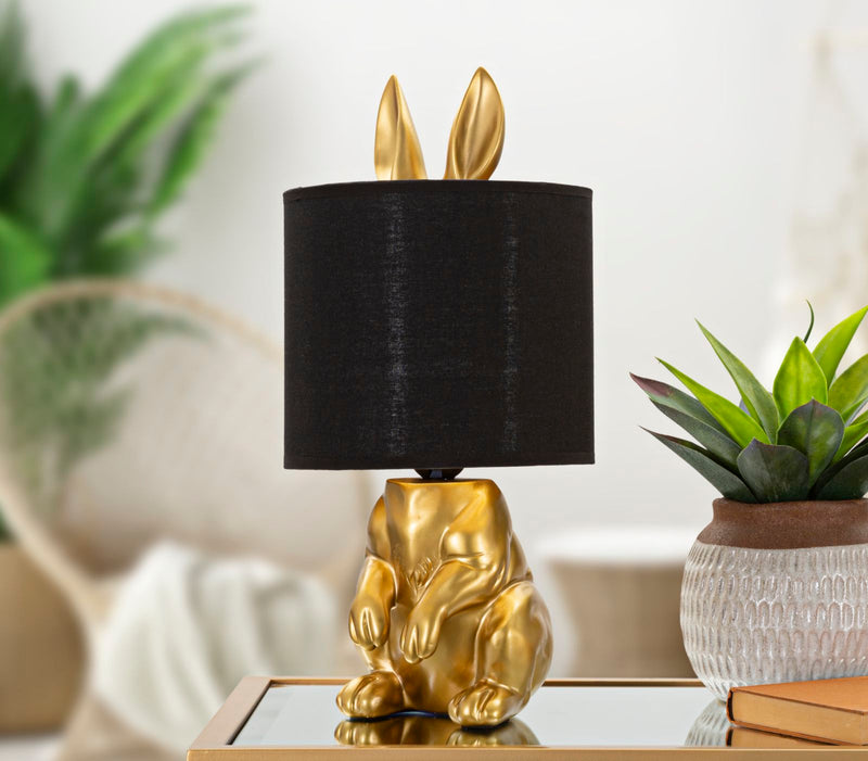 lampada design modello coniglio colore oro paralume in tessuto nero