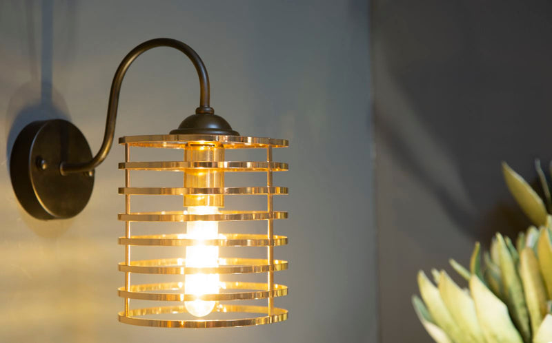 Applique moderna una lampada in metallo dorato e nero cm 16x27x26h