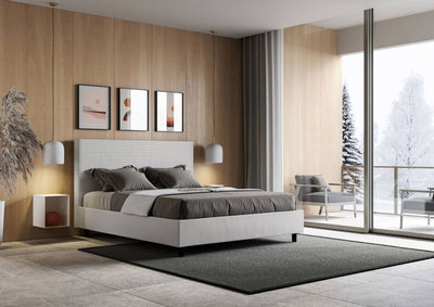letto design Made in Italy con contenitore similpelle bianco
