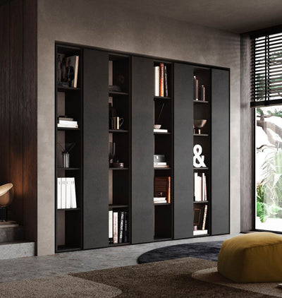 parete libreria moderna con vanio aperti e chiusi in legno