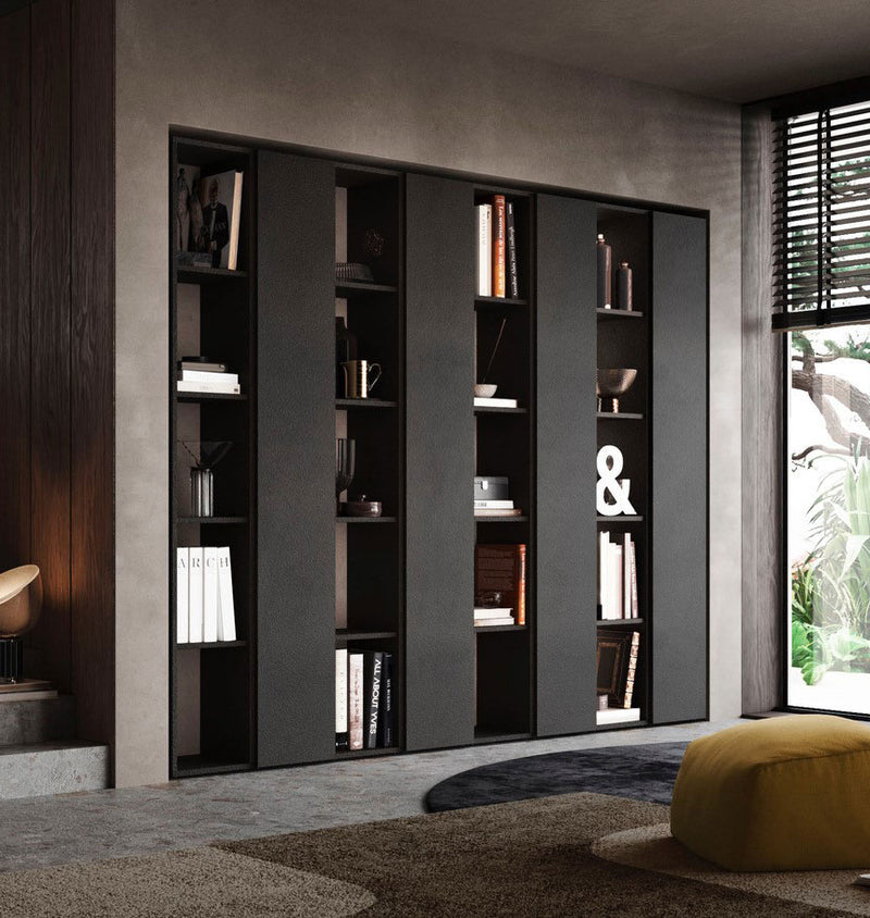 parete libreria moderna con vanio aperti e chiusi in legno