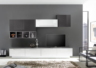 parete attrezzata con mobile tv bianco lucido cemento e grigio lucido