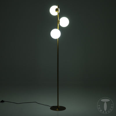 Piantana moderna in metallo colore ottone 3 sfere in vetro bianco cm Ø 30x160h