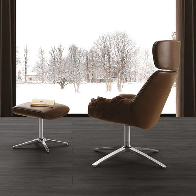 Poltrona con pouf imbottita rivestita in ecopelle struttura in alluminio - vari colori