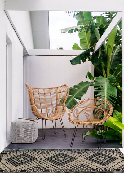 poltrona in rattan colore naturale