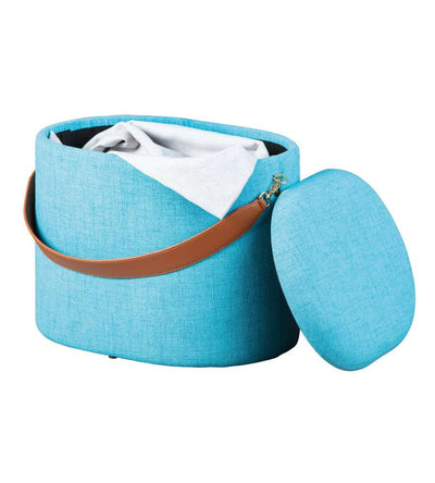 pouf contenitore moderno in tessuto azzurro con maniglia