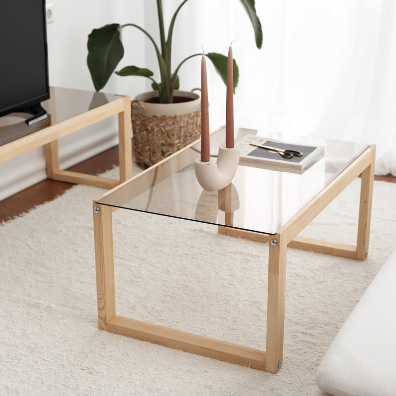 Tavolino basso design con gambe in massello e ripiano in vetro cm 85x55x40h - vari colori