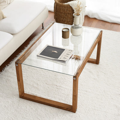 Tavolino basso design con gambe in massello e ripiano in vetro cm 85x55x40h - vari colori