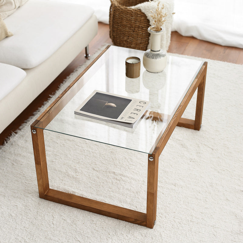 Tavolino basso design con gambe in massello e ripiano in vetro cm 85x55x40h - vari colori