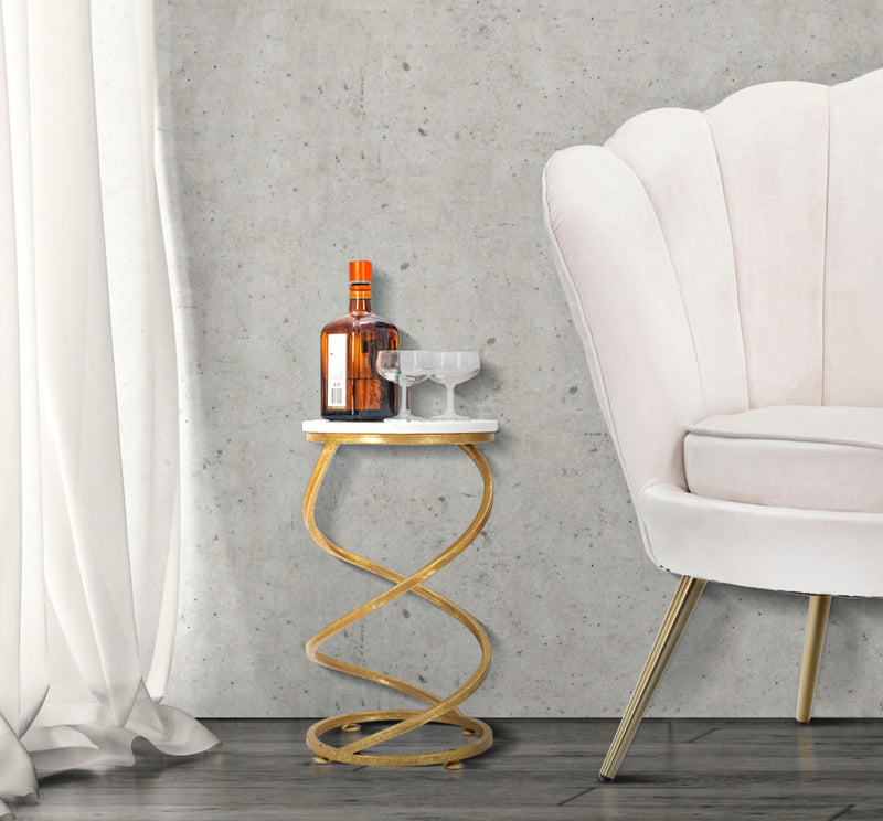 Tavolino design tondo struttura a spirale in metallo dorato piano effetto marmo cm Ø 27x47h