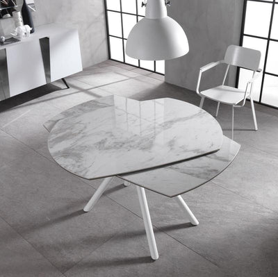 Tavolo moderno allungabile girevole con piano in ceramica effetto marmo cm 120/180x90x76h