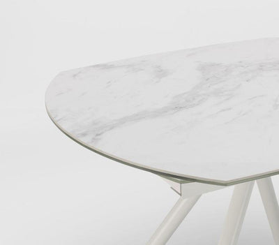 Tavolo moderno allungabile girevole con piano in ceramica effetto marmo cm 120/180x90x76h