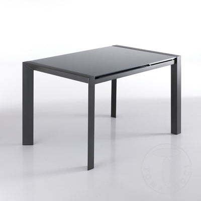 Tavolo moderno allungabile fino a 182 cm piano in vetro grigio e gambe in metallo