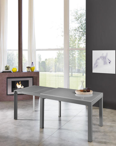 Tavolo allungabile moderno con piano in vetro colore grigio cm 83x120/350x75h