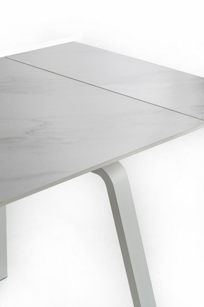Tavolo moderno allungabile top effetto marmo gambe in metallo colore bianco cm 140/200x80x76h