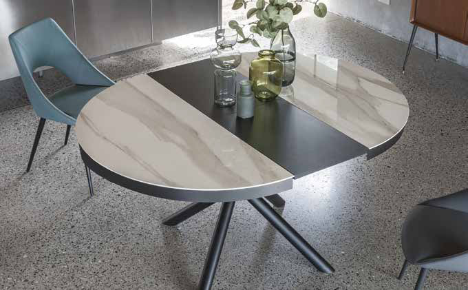 Medoz - Tavolo allungabile rotondo piano in ceramica base in metallo cm 120/165x76h - vari colori